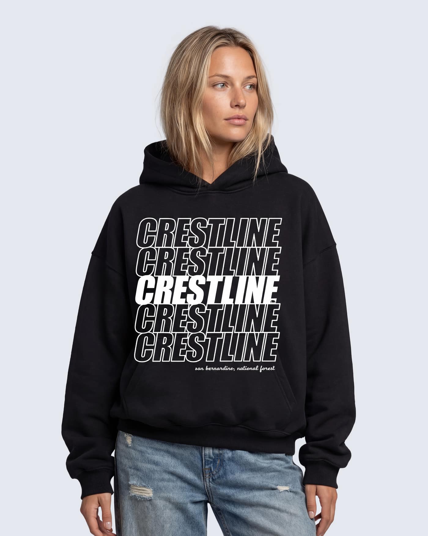 Black boxy hoodie with stacked “Crestline” typography
