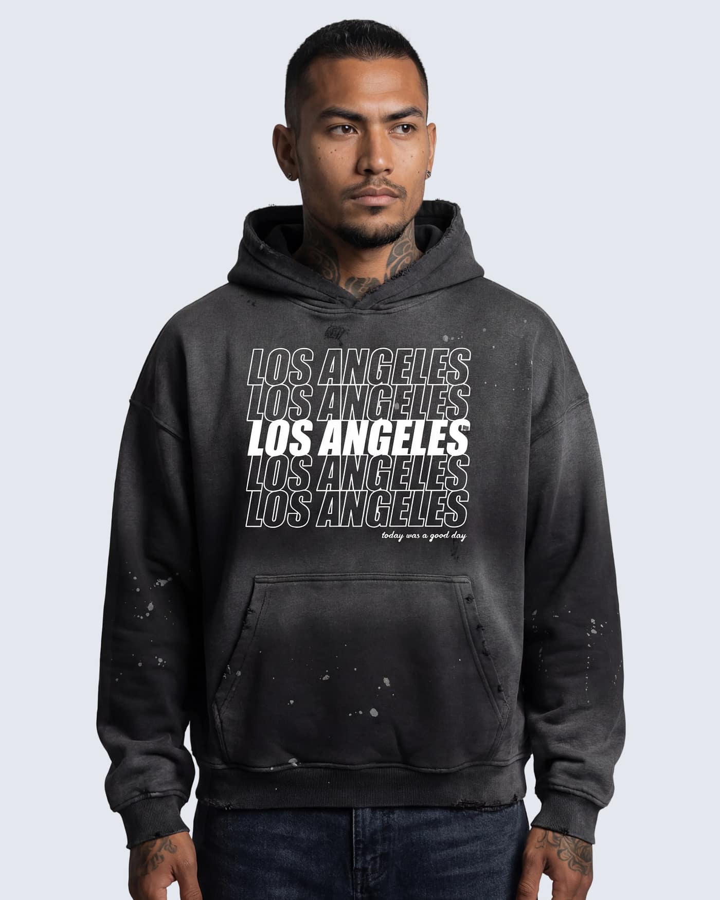 Black vintage washed hoodie with distressed “Los Angeles” text design