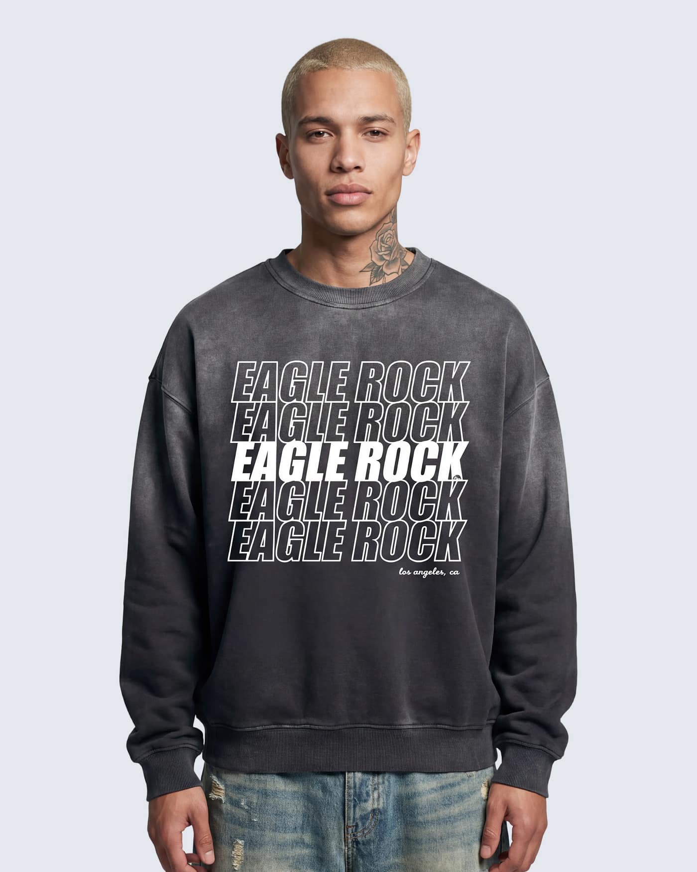 Charcoal sunfade sweatshirt with repeated “Eagle Rock” text graphic