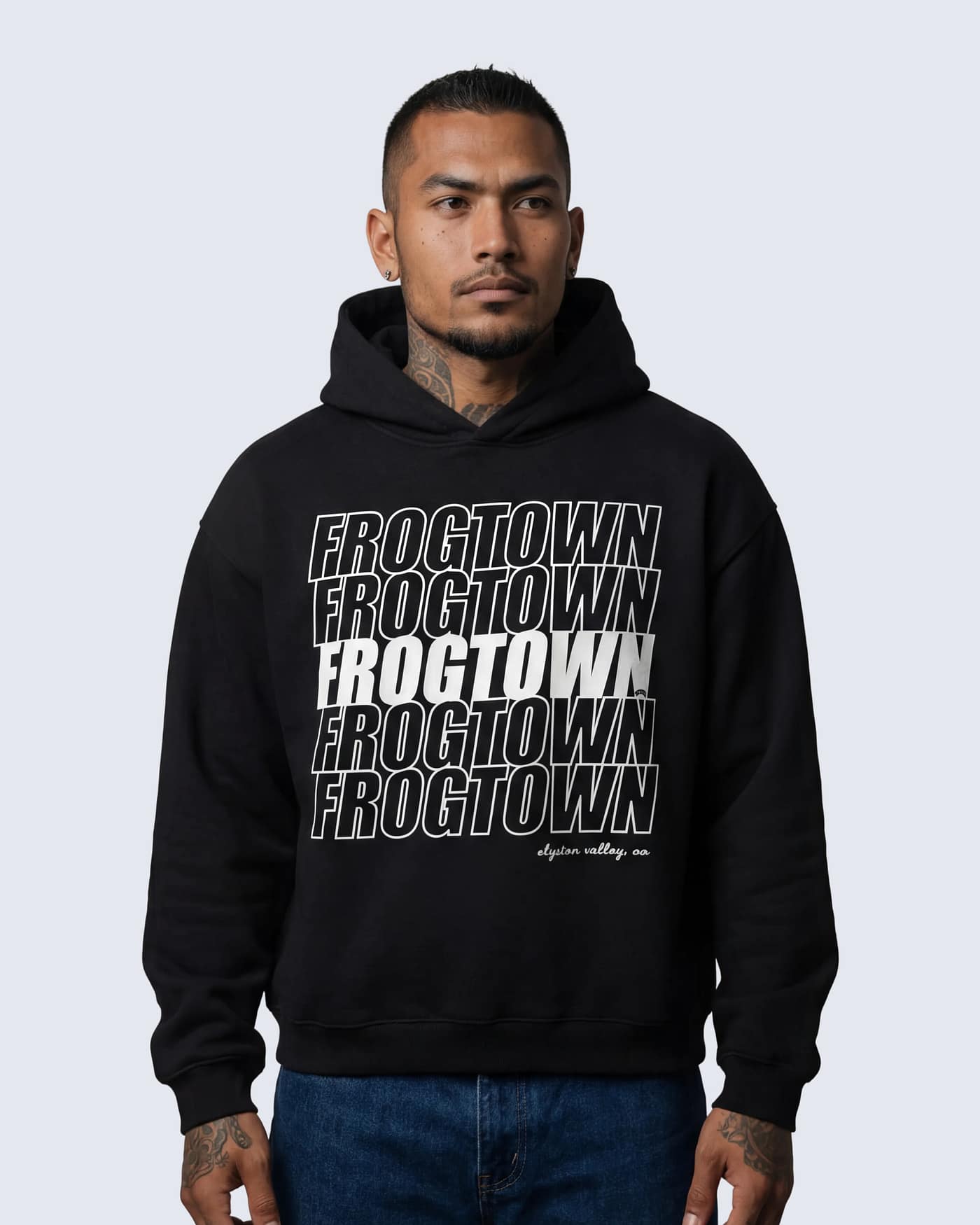 Black boxy hoodie with repeated “Frogtown” typography